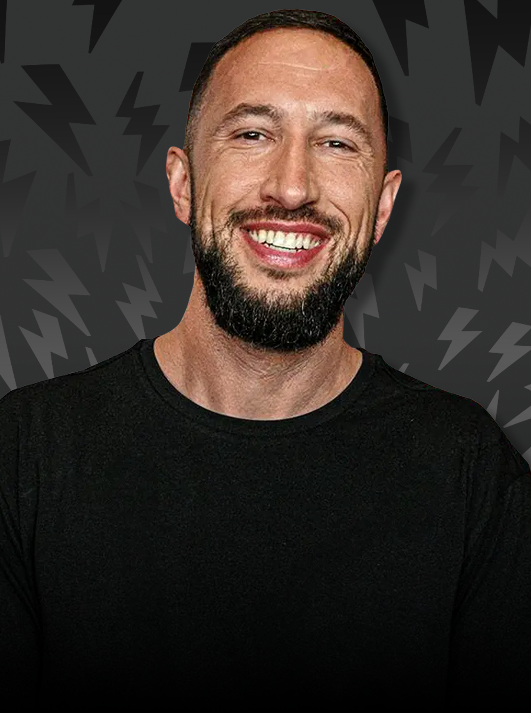 Man with a beard smiling against a dark background with abstract shapes